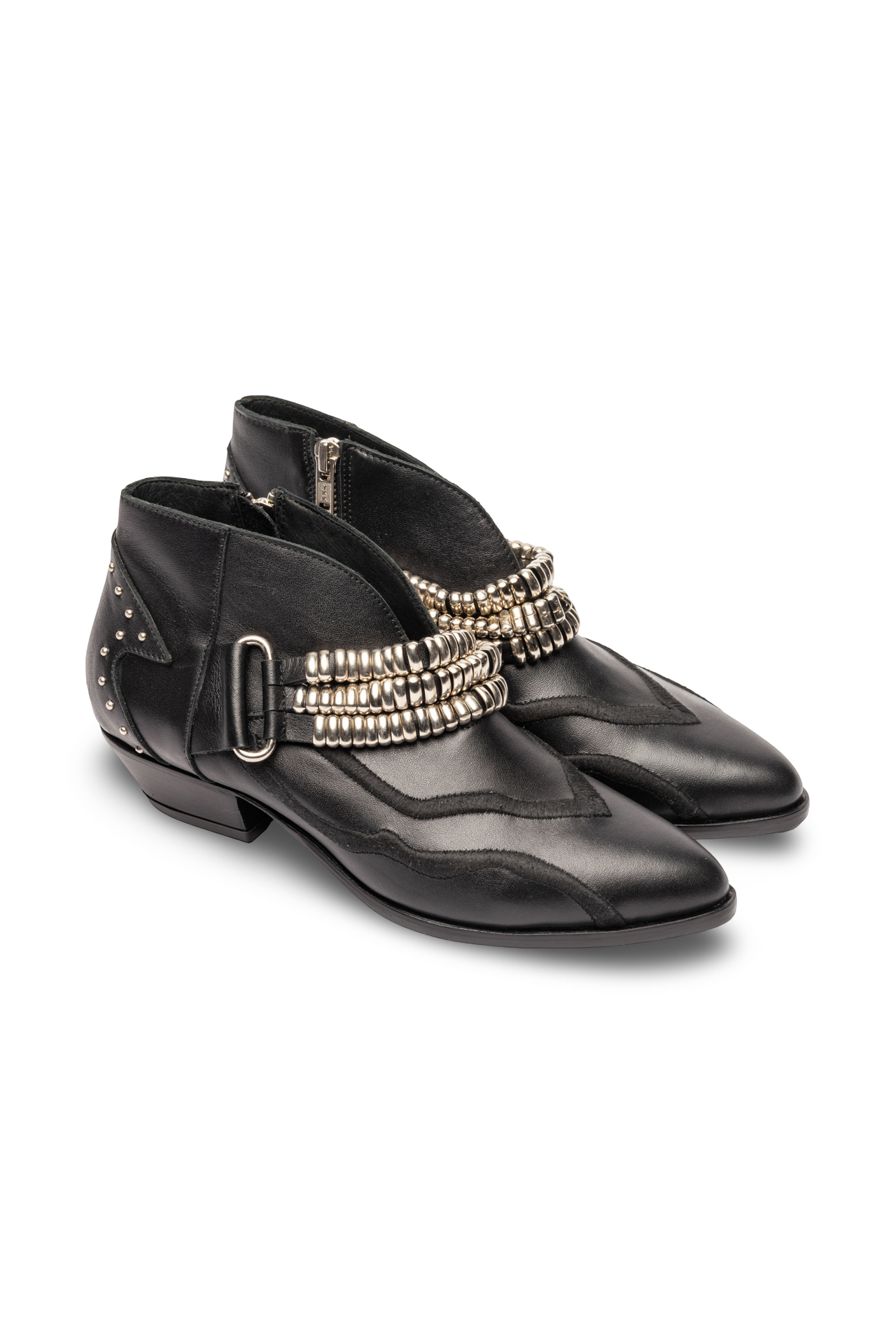 Black ankle boots with gold chain detail on a white background