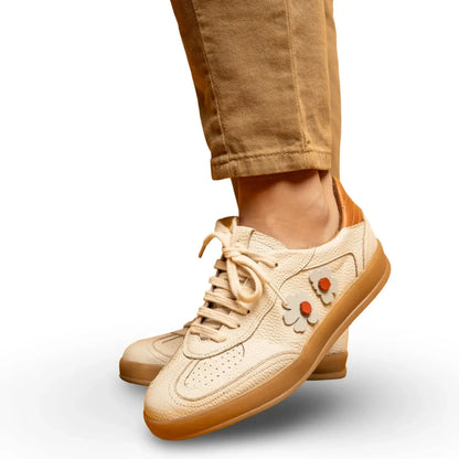 Beige sneakers with brown accents 