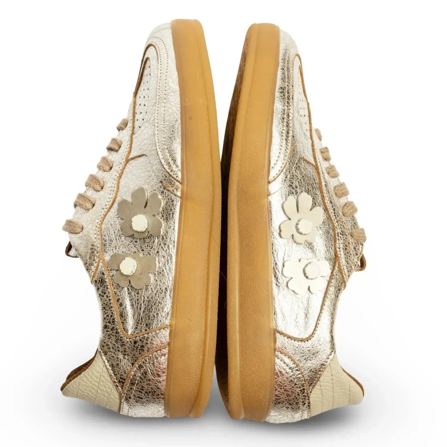 Pair of decorative shoes with floral patterns
